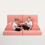 Universelles Kindersofa von monboxy in Lachsrosa - Kletterling – einfach Kind sein