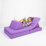 Universelles Kindersofa von monboxy in Lila - Kletterling – einfach Kind sein